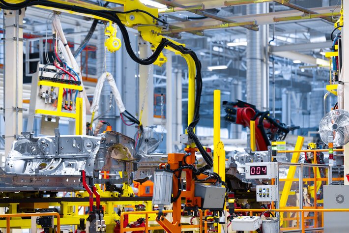 modern automated assembly line for cars. latest technological neutral technologies of production of cars at plant.