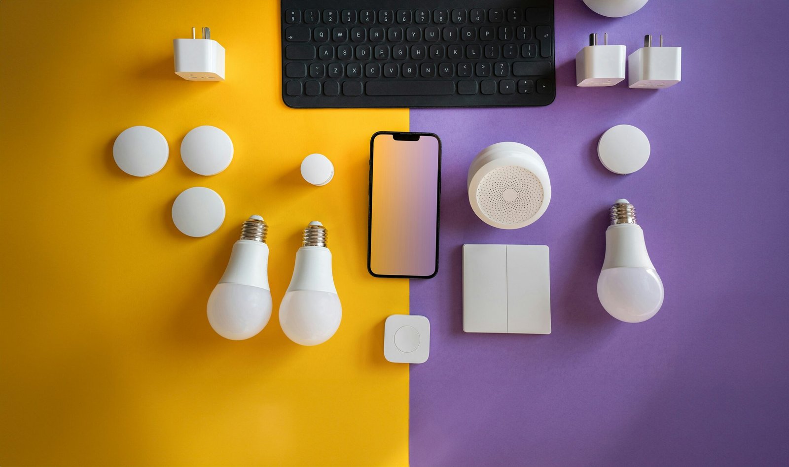 a computer keyboard, light bulbs, and other electronics on a purple and yellow background